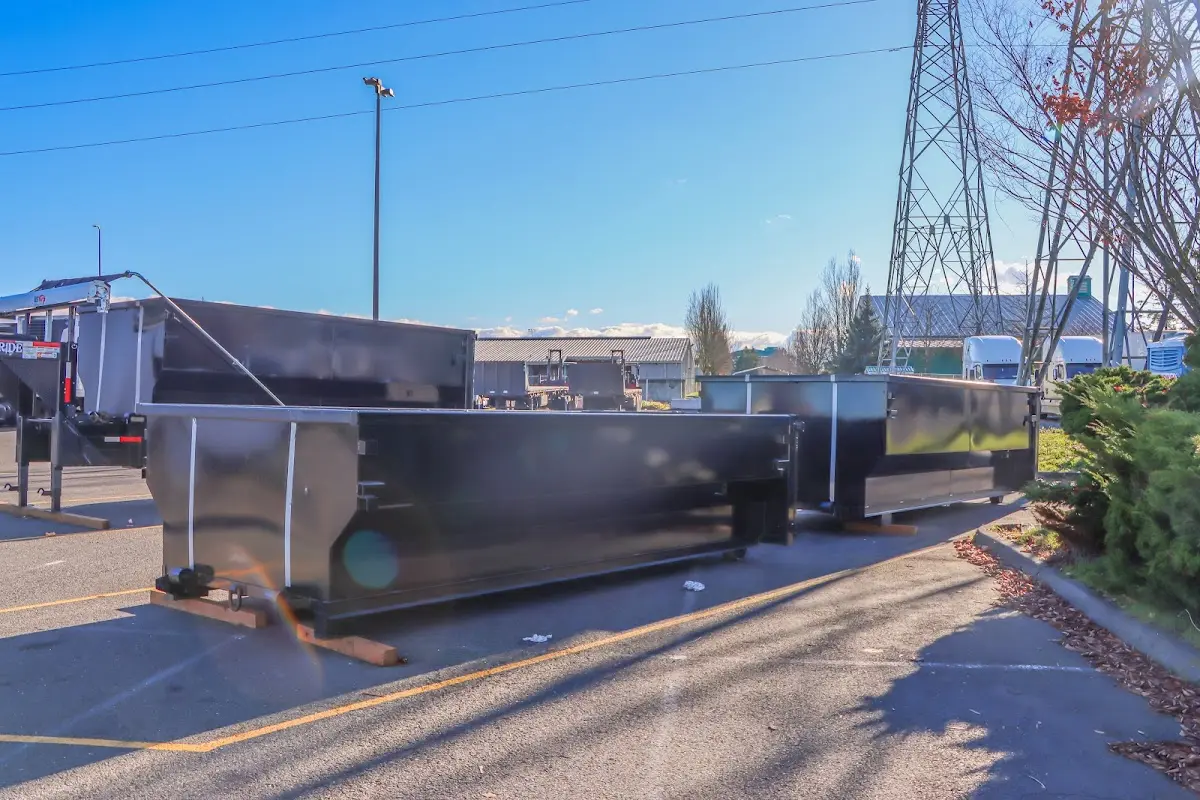 Roll-off dumpster ready for waste disposal at job site for Yard Waste Dumpster Rental in Glenolden